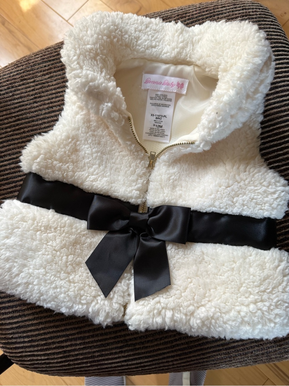 Bonnie Baby Cream Sherpa Vest with Black Satin Bow